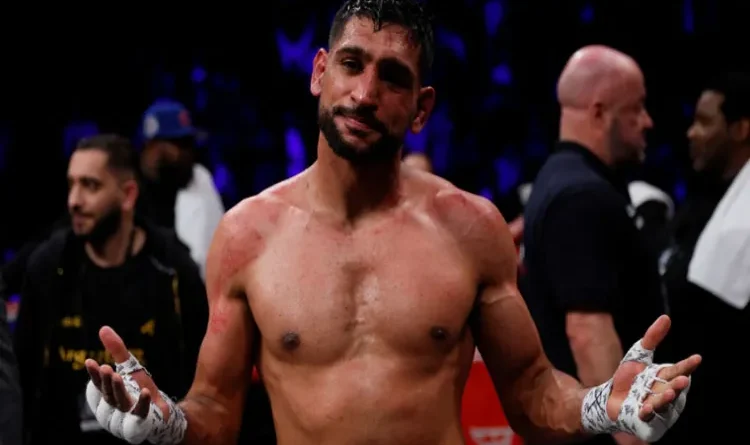 Britain's retired boxer Amir Khan banned for two years for doping