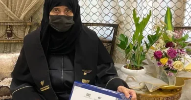 Picture of changing Arab, elderly woman Salwa Al-Omani graduates at 70