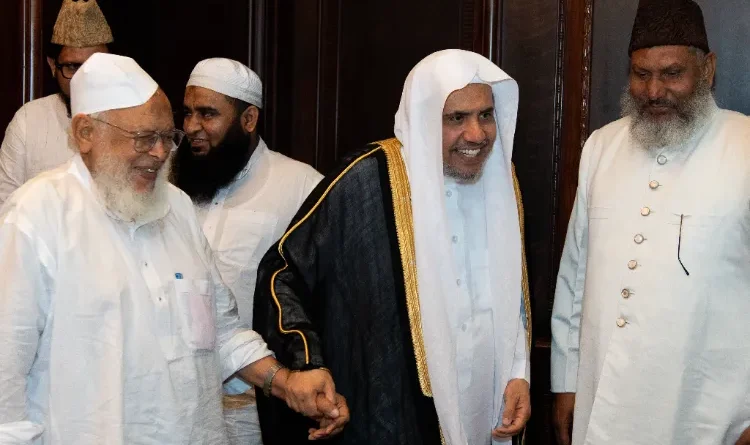 Calling the General Secretary of the Muslim World League, Dr. Issa to India and playing the bean of communal harmony, silent on the destruction of Muslims in Mewat?