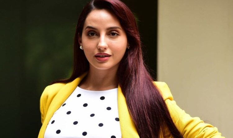Why did Nora Fatehi say that only four girls are getting continuous work in the Bollywood industry?