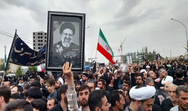 Crowd gathered at the funeral of victims of helicopter crash in Iran's Qom, President Raisi will be laid to rest on Thursday.