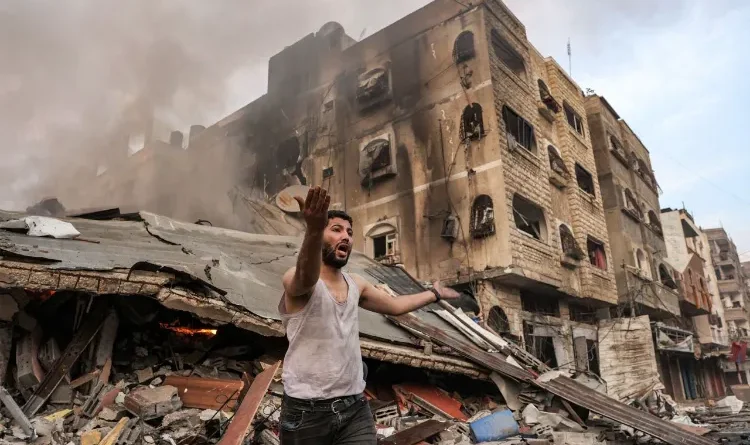 Standing on the rubble of Gaza and pretending to be just!